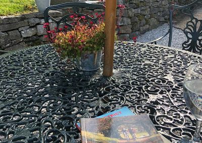 Sitting in the Garden Planning a Bike Ride/Cycling Trip